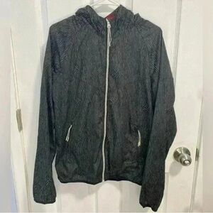 NIKE Women's Zebra Reflective Windbreaker
Size Medium
